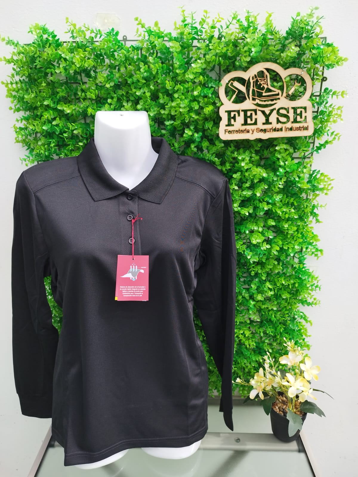 POLERA DRY FIT M/LARGA MUJER $ 8.990